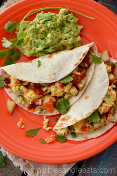 Breakfast Tacos with Mexican Style Eggs and Potatoes - Nibbles and Feasts