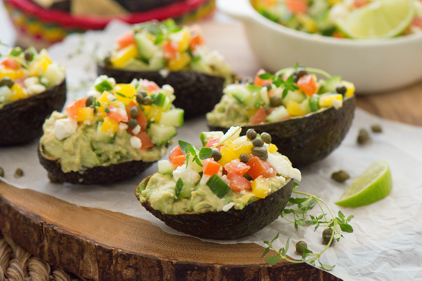 Hummus Avocado Cups with Spicy Greek Salad - Nibbles and Feasts